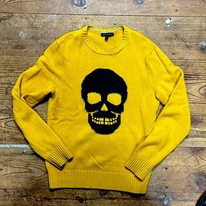 Gold skull sweater.